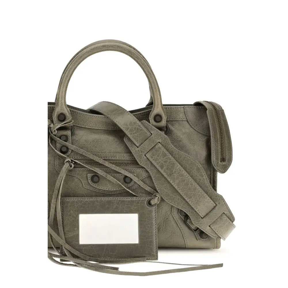 Un sac à main balenciaga bicolor lamb ovis aries en cuir olive structuré avec anses et bandoulière réglable