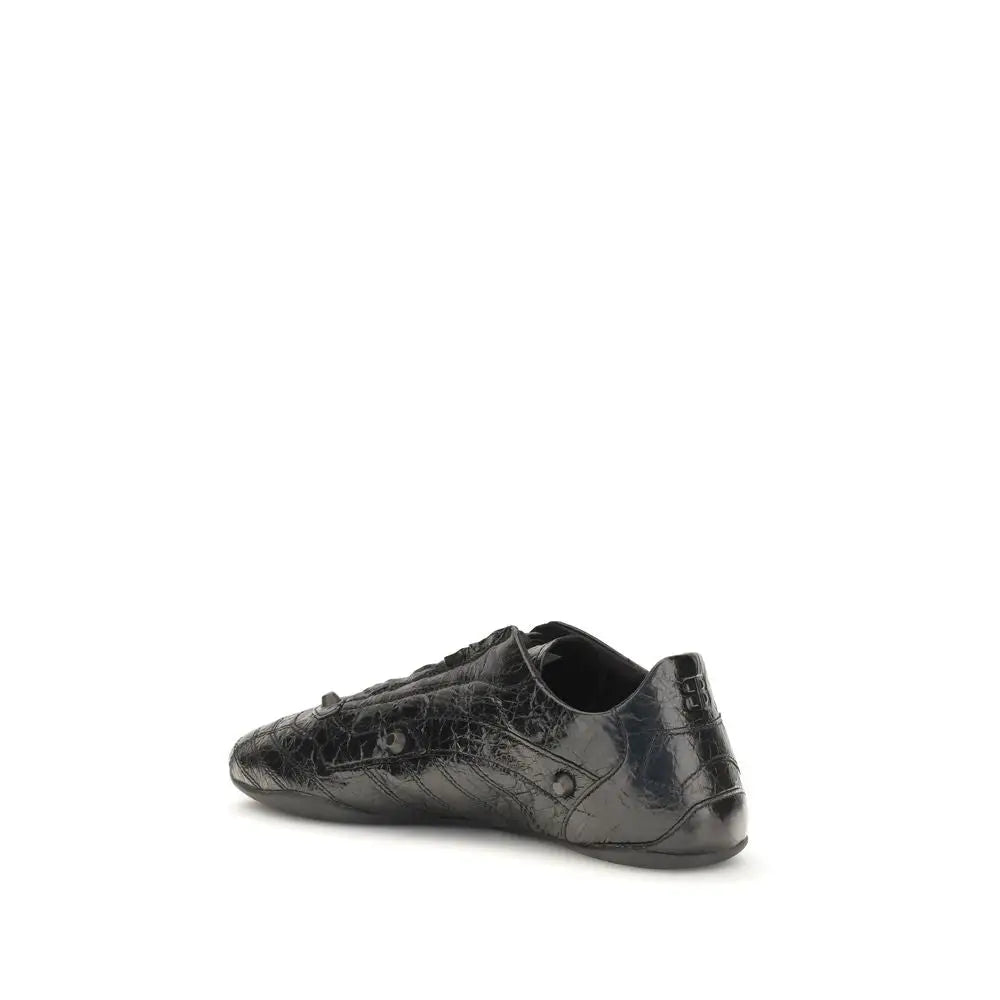 Baskets balenciaga noires en cuir de veau avec finition vernie et texture crocodile embossée