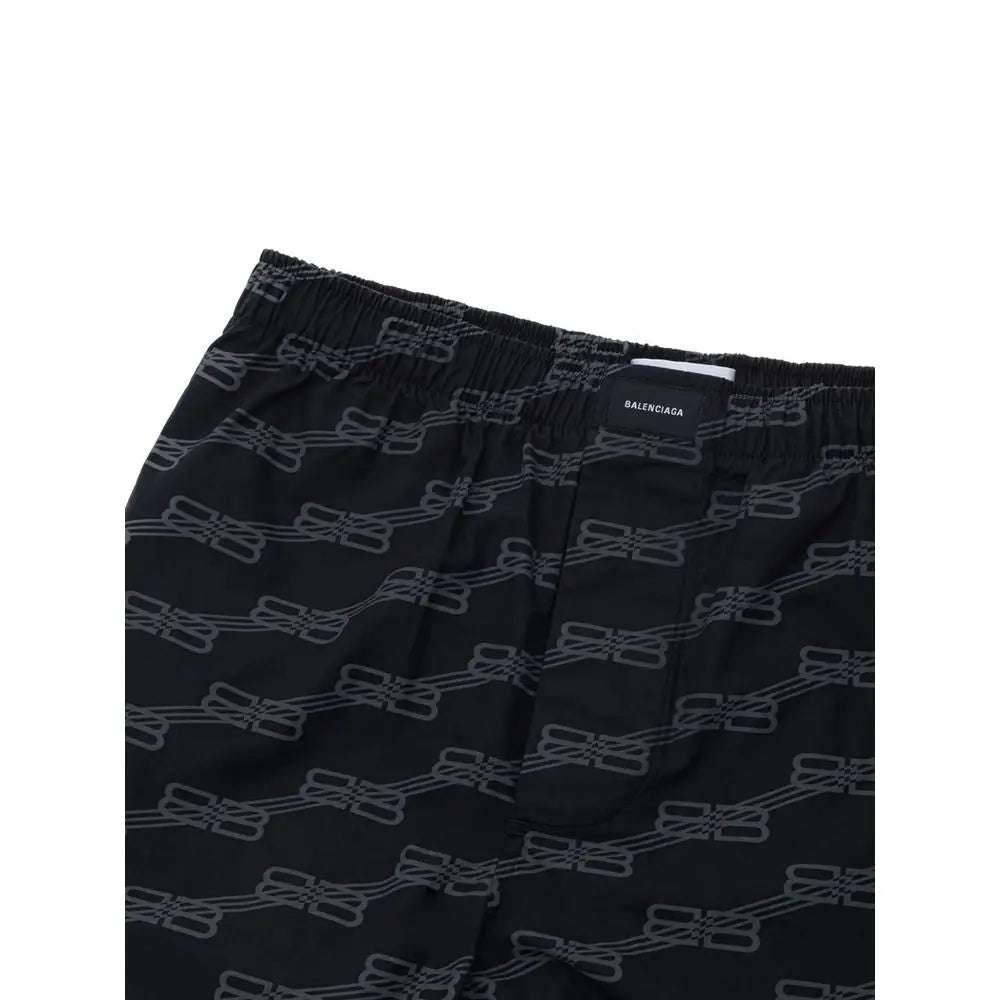 Shorts bermuda balenciaga noirs en coton avec motif chaîne grise répétée sur le tissu