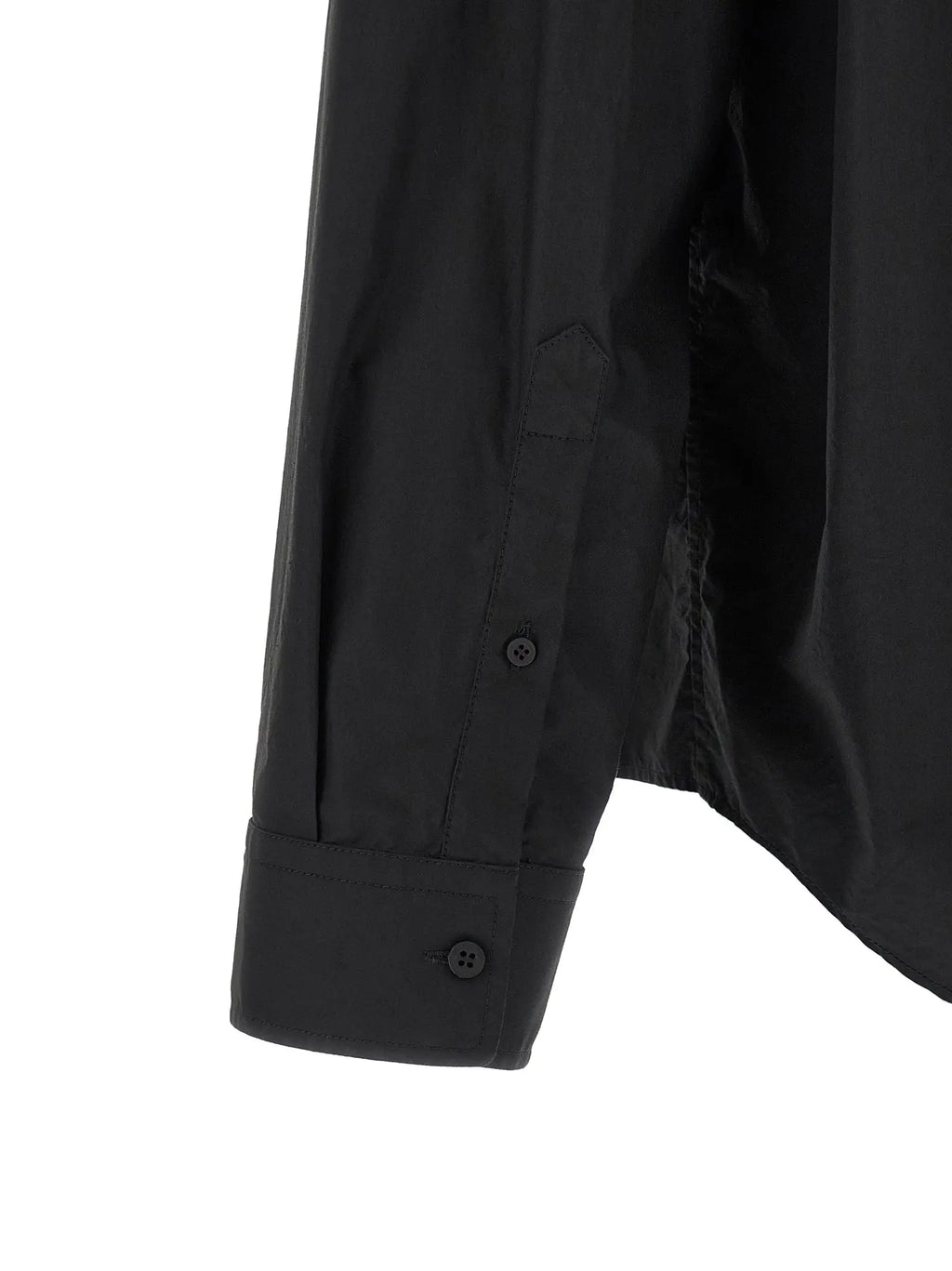 Manche de blouse balenciaga noire en coton avec un léger brillant et des poignets cousus avec soin