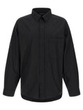 Blouse en coton noire balenciaga à manches longues avec col classique et poche poitrine avec branding discret sur la manche