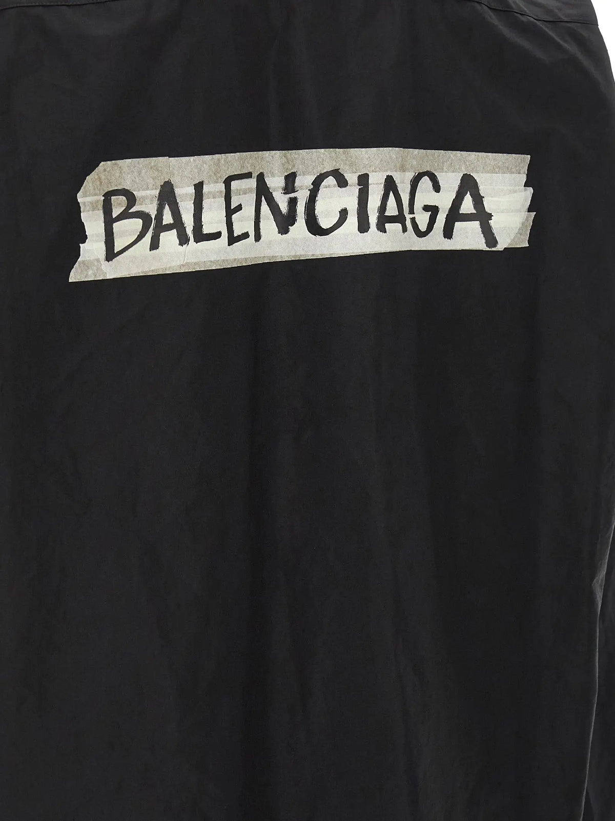 Veste balenciaga noire en coton avec logo graffiti audacieux sur bande déchirée au dos