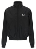 Veste bomber balenciaga noire en coton avec logo blanc sur la poitrine et poignets côtelés