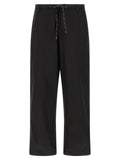 Pantalon chino balenciaga noir en coton avec jambes larges et taille à cordon à surpiqûres blanches contrastées