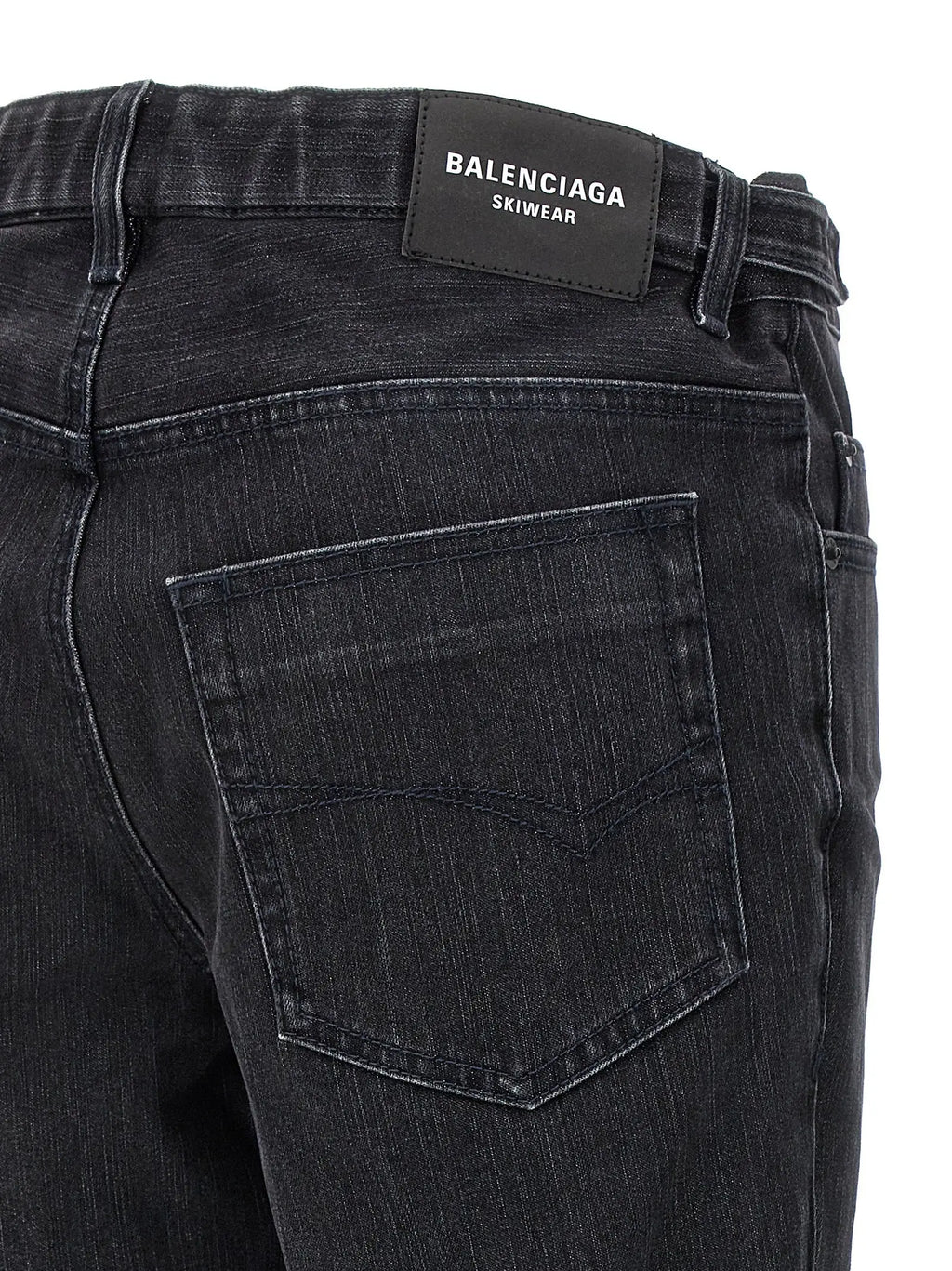 Jean flare balenciaga noir en coton avec étiquette skiwear visible à la taille vue de dos