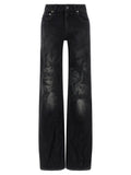 Jean flare balenciaga noir en coton avec jambe large délavé et détails usés subtils