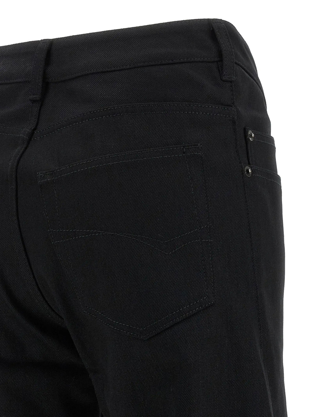 Vue arrière des jeans balenciaga noirs en coton flare avec poches arrière classiques et coutures discrètes