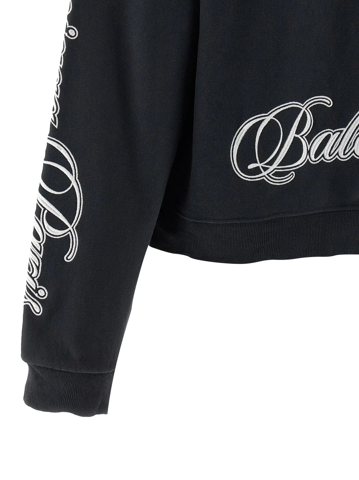 Sweatshirt balenciaga noir en coton avec broderie blanche cursive sur la manche et la poitrine