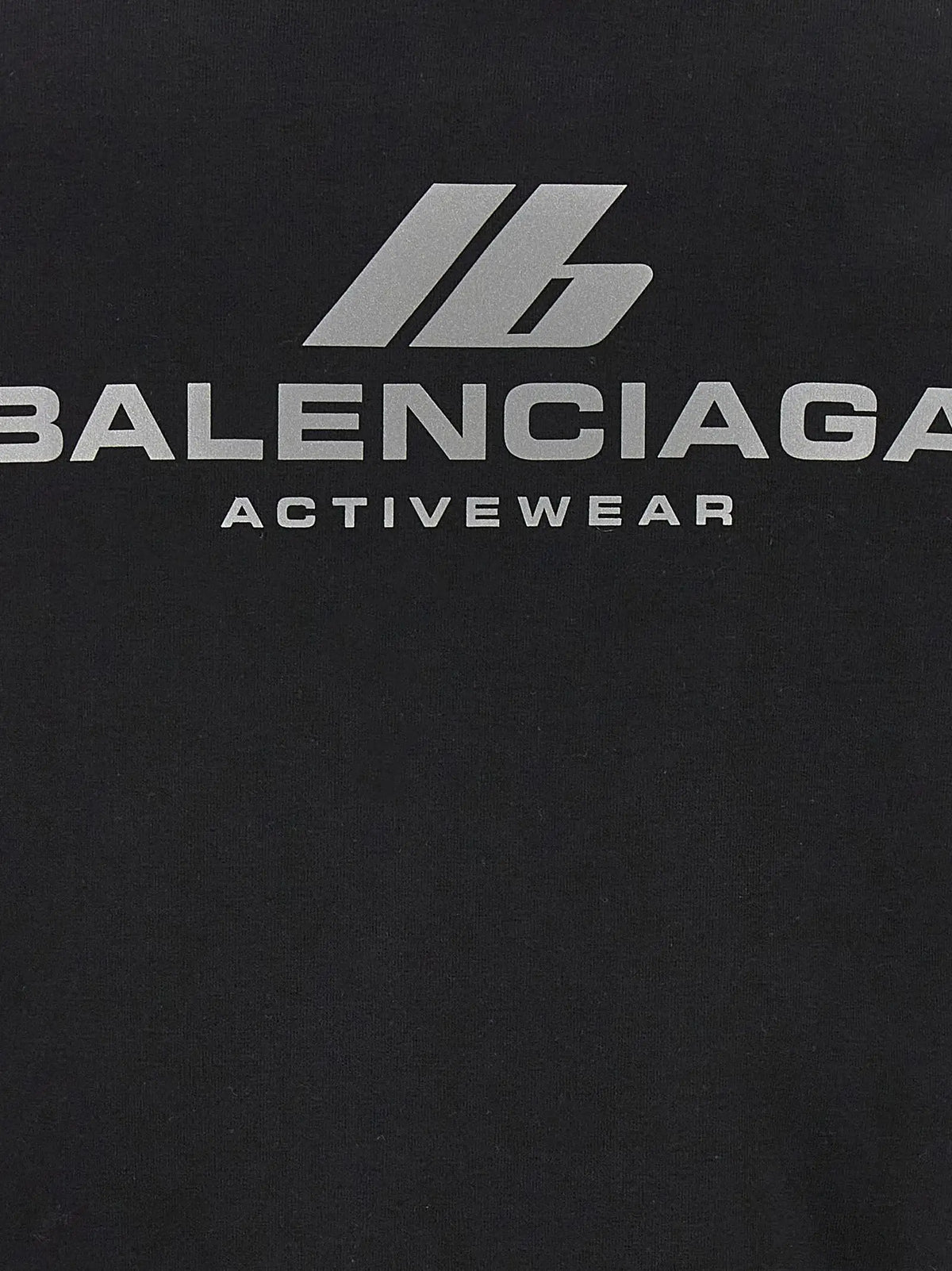 T-shirt de sport balenciaga noir en coton avec logo et texte argenté visible sur le devant
