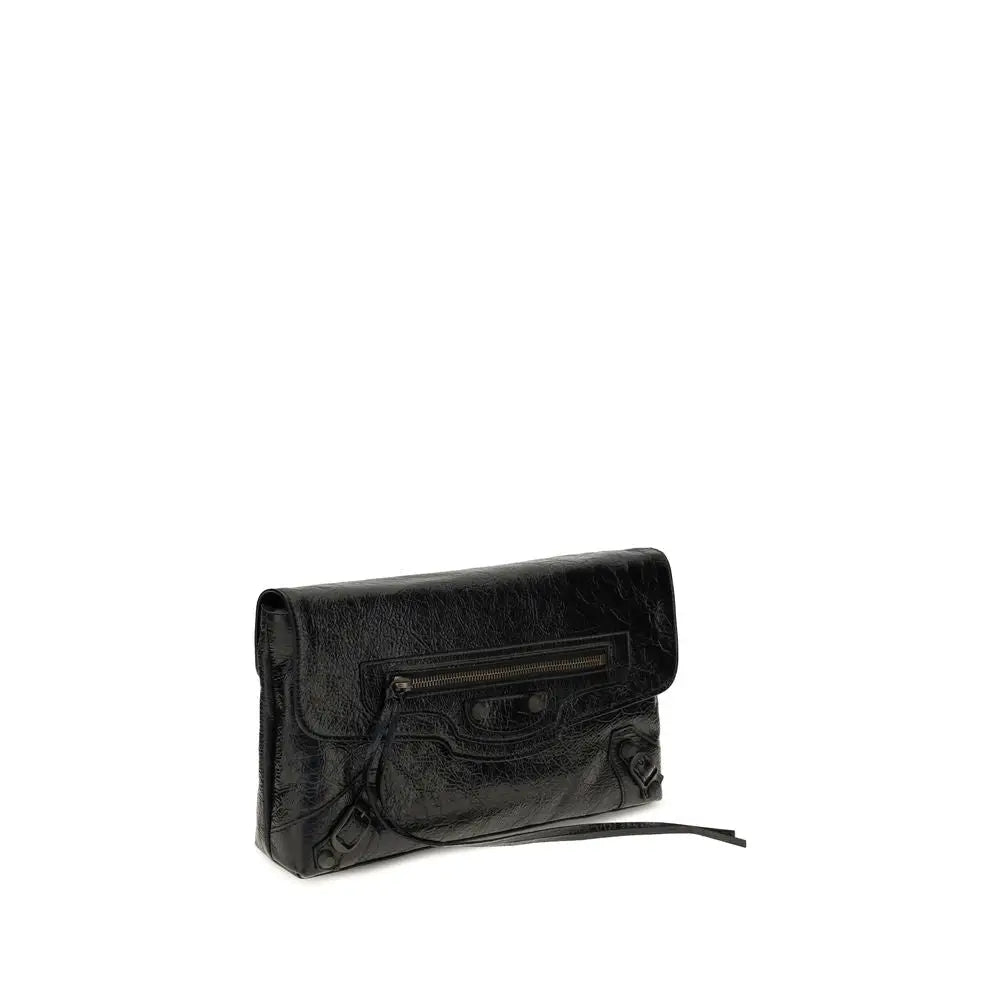Balenciaga black lamb ovis aries clutch bag en cuir noir texturé avec fermeture métallique élégante
