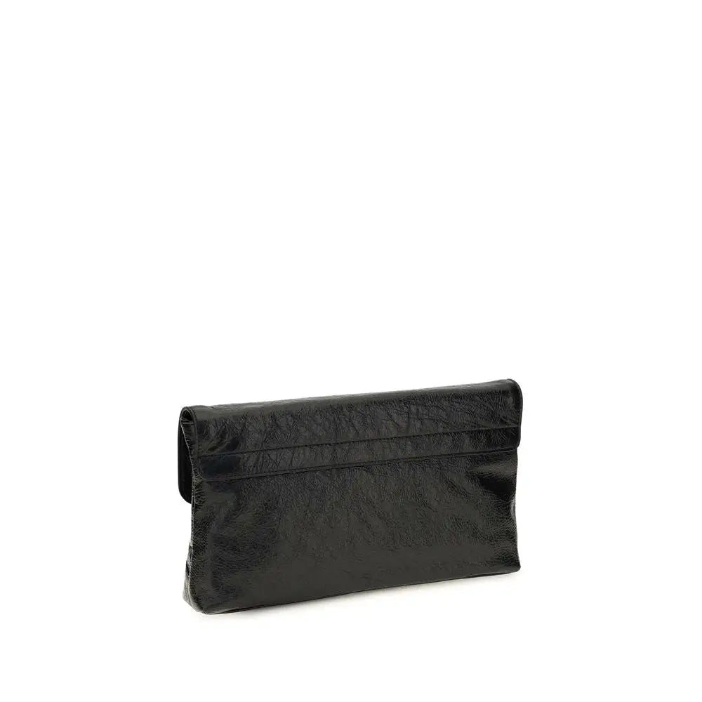 Balenciaga black lamb ovis aries clutch bag with glossy textured surface and sleek flap closure