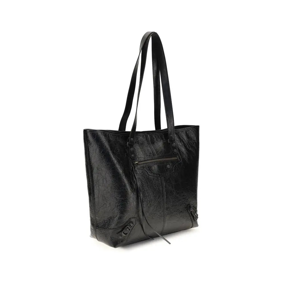 Sac bandoulière balenciaga noir en cuir dagneau avec finition brillante et logo embossé distinctif