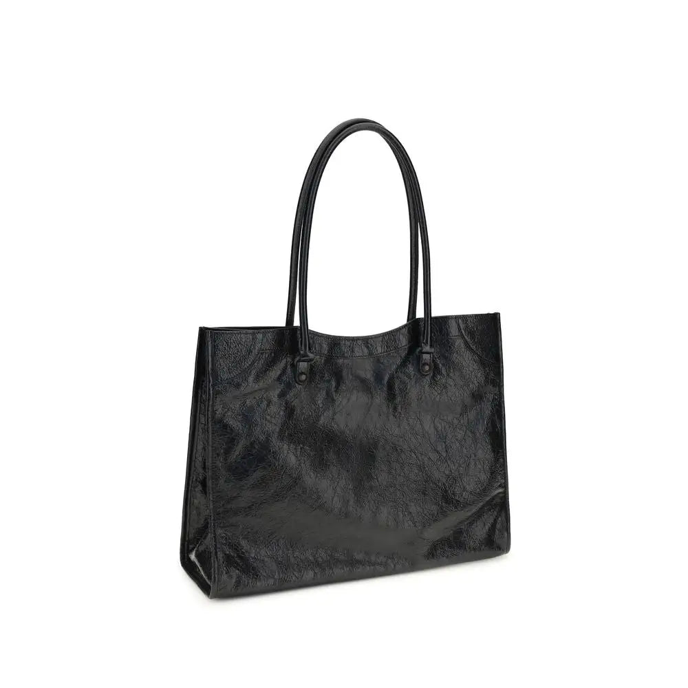 Sac épaule balenciaga black lamb ovis aries en cuir noir brillant avec texture légèrement froissée et anses élégantes