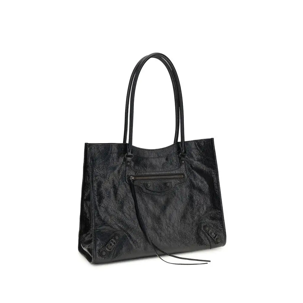 Sac bandoulière balenciaga black lamb ovis aries en cuir verni noir avec texture froissée et poignées structurées