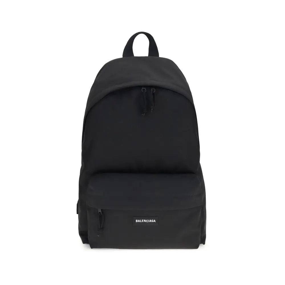 Sac à dos balenciaga noir en polyamide avec design minimaliste et branding discret sur la poche avant
