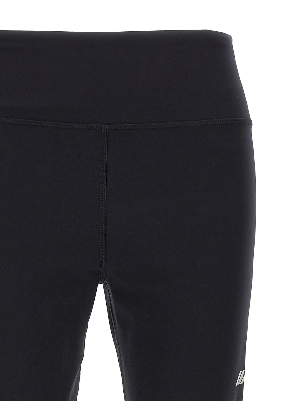 Leggings balenciaga noirs en polyamide taille haute avec design moulant et logo blanc discret sur la jambe