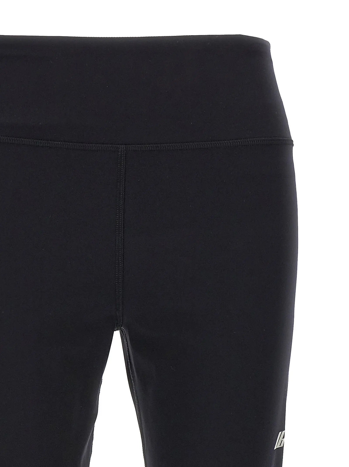 Leggings balenciaga noirs en polyamide taille haute avec design moulant et logo blanc discret sur la jambe