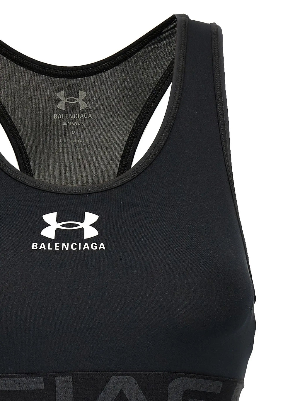 Balenciaga black polyester sport bra with white logo and mesh back showing the back side of the under armour x balenciaga bra