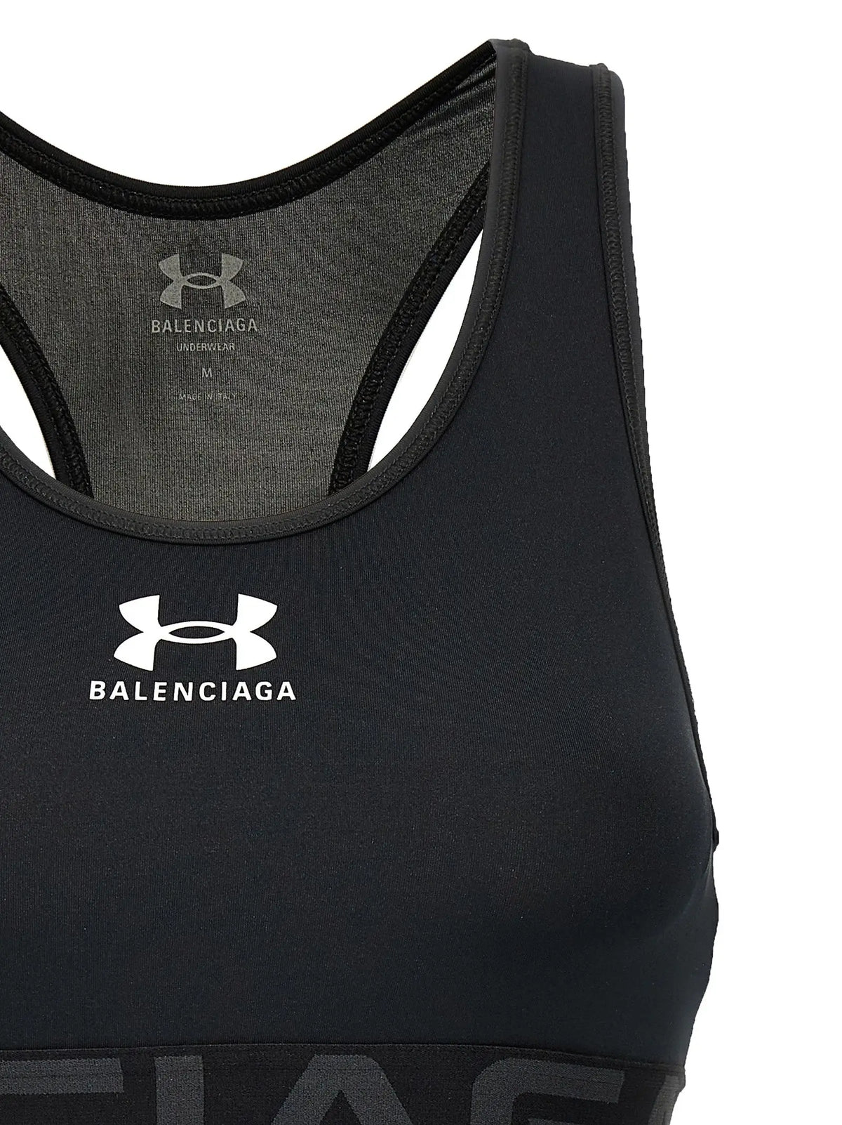 Balenciaga black polyester sport bra with white logo and mesh back showing the back side of the under armour x balenciaga bra