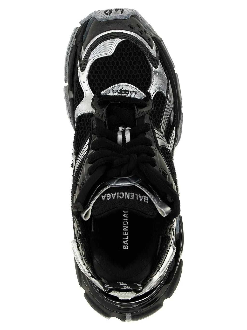 Balenciaga black polyethylene athletic sneakers featuring black and silver triple s design with mesh panels and glossy rubber accents