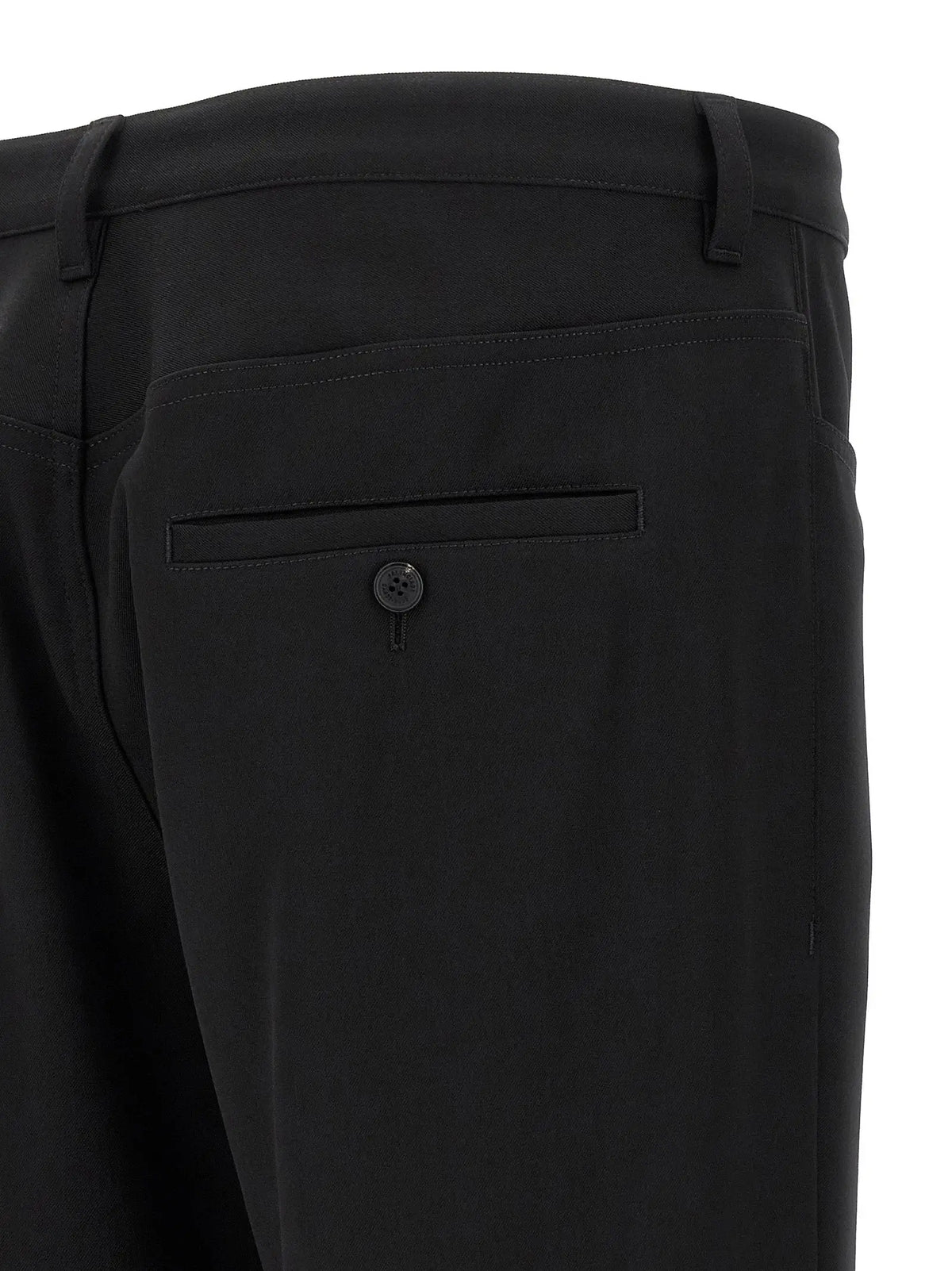 Pantalon habillé en laine noire balenciaga avec coupe ajustée et détails de couture subtils