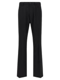 Pantalon habillé en laine noir balenciaga avec coupe droite élégante et plis subtils à l’avant