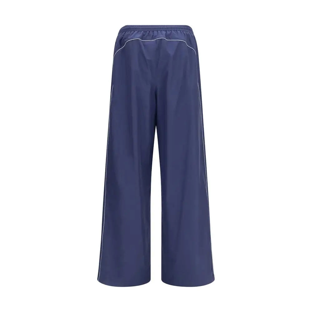 Pantalon de sport bleu marine balenciaga en coton avec coupe large et piping blanc le long des coutures
