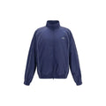 Veste coquille en coton bleu balenciaga avec fermeture éclair et liseré blanc et petit logo sur la poitrine gauche