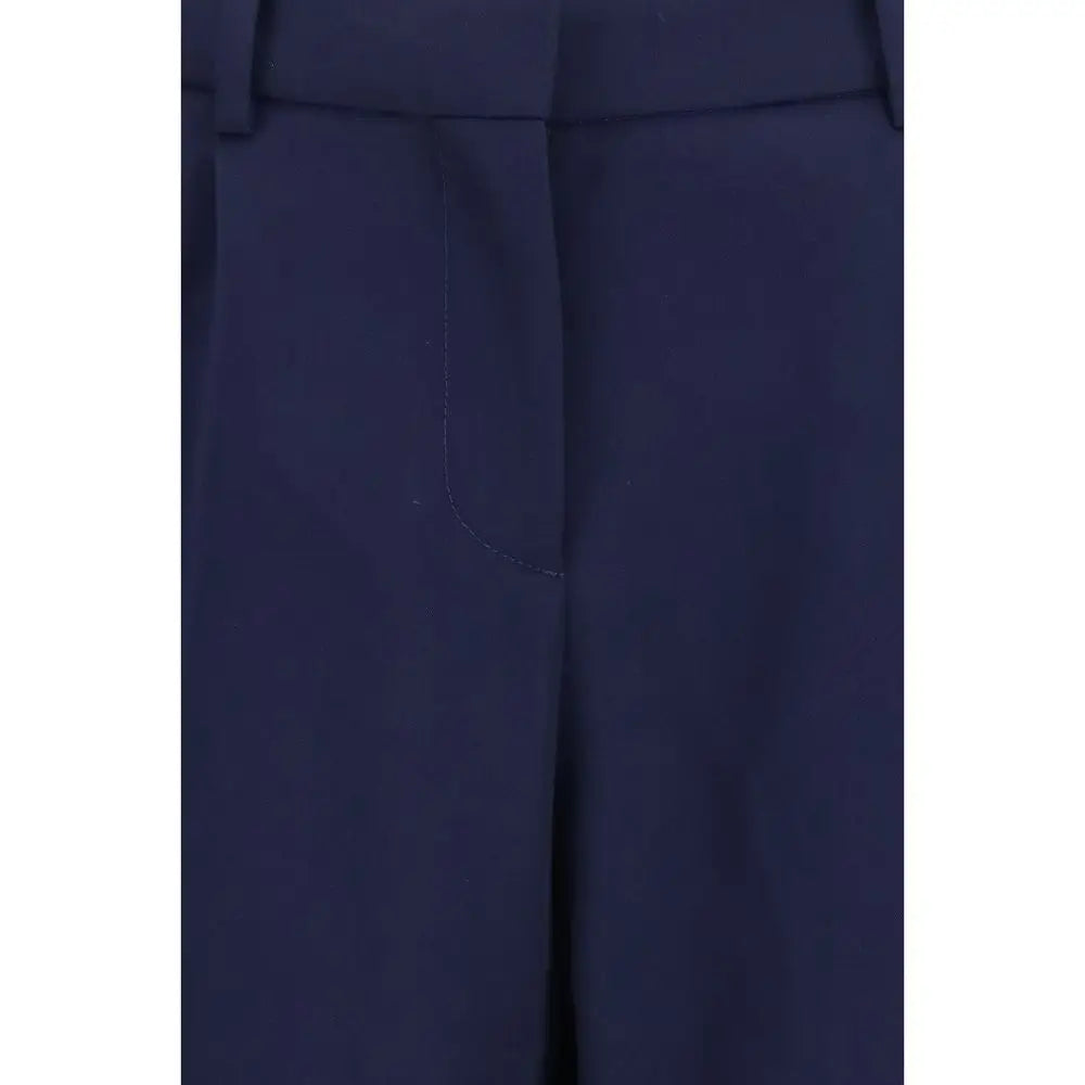Pantalon balenciaga bleu en laine avec coupe ajustée et plis discrets sur le devant
