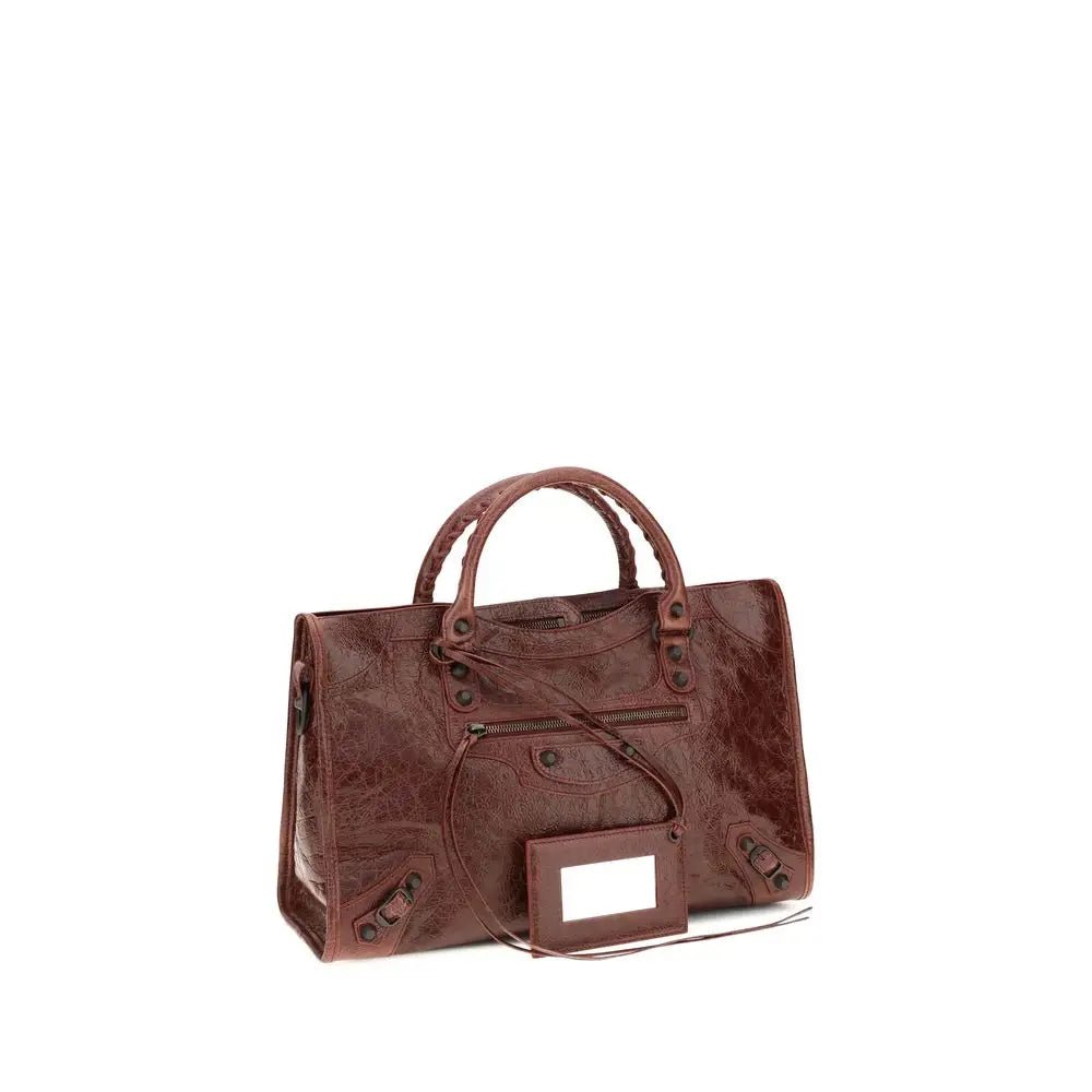 Sac à bandoulière balenciaga bordeaux en cuir dagneau ovis aries bordeaux avec surface texturée et poignées tressées