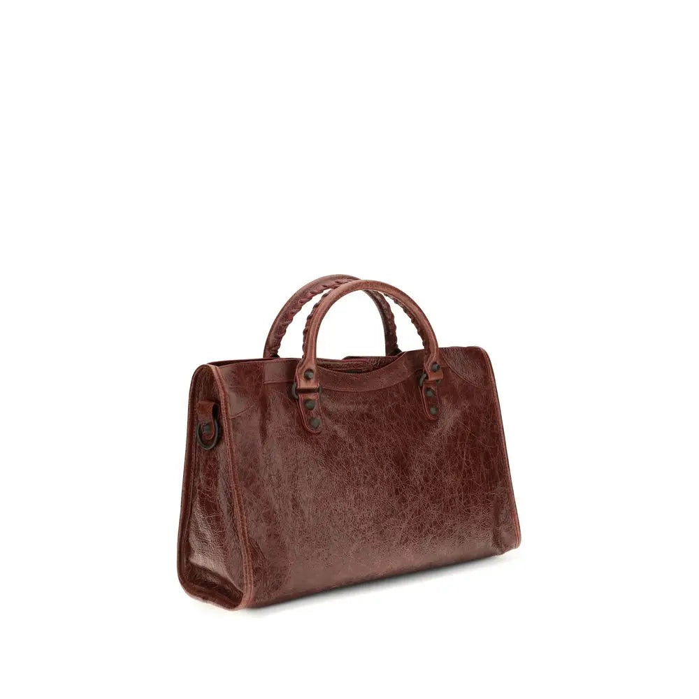 Sac bandoulière balenciaga bordeaux en cuir dagneau avec poignées tressées et ferrures signature marron