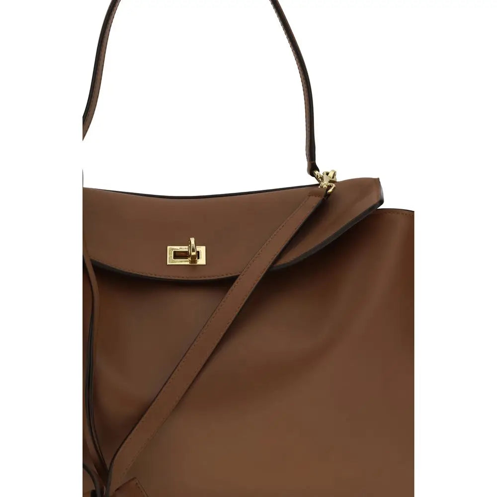 Sac à bandoulière balenciaga en cuir de veau marron avec fermoir doré et sangle assortie