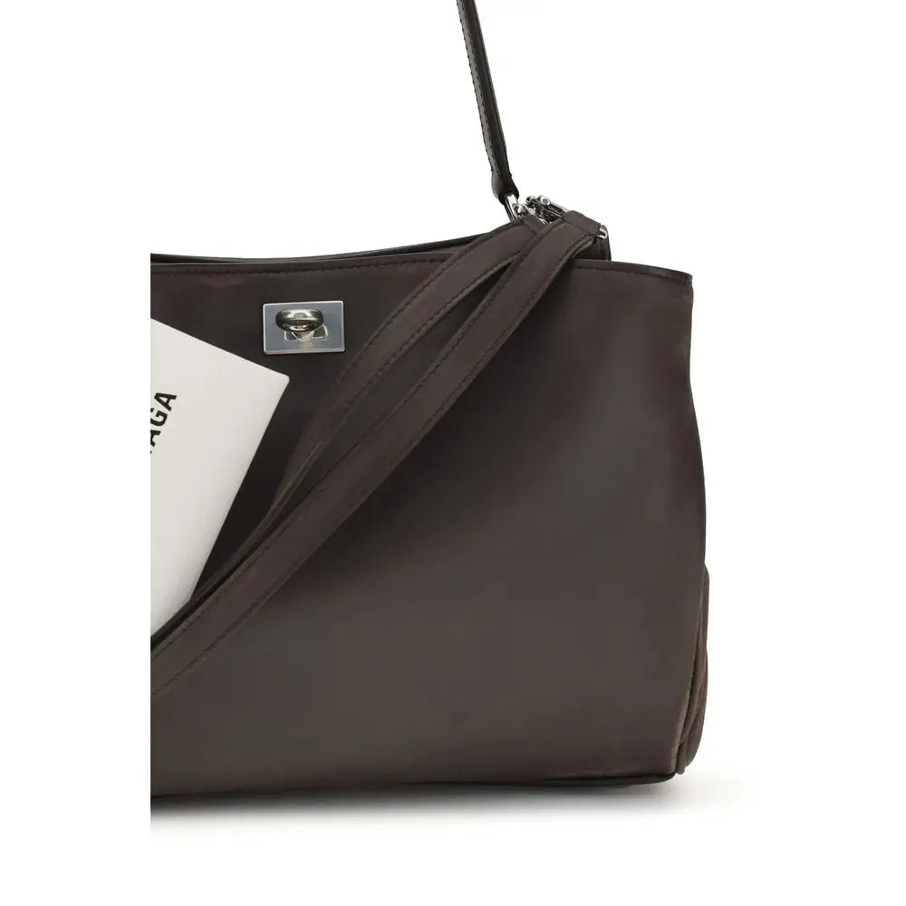 Sac bandoulière balenciaga brown calf leather bos taurus en cuir marron foncé avec fermoir métal argenté et bretelle noire