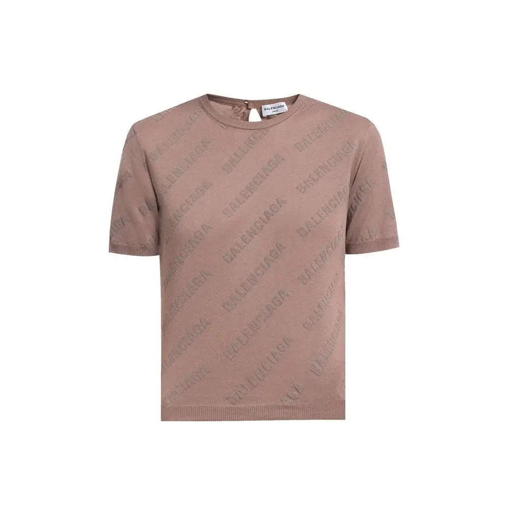 Tee en maille manches courtes balenciaga couleur rose poussiére avec imprimé logo répétitif pour un style décontracté