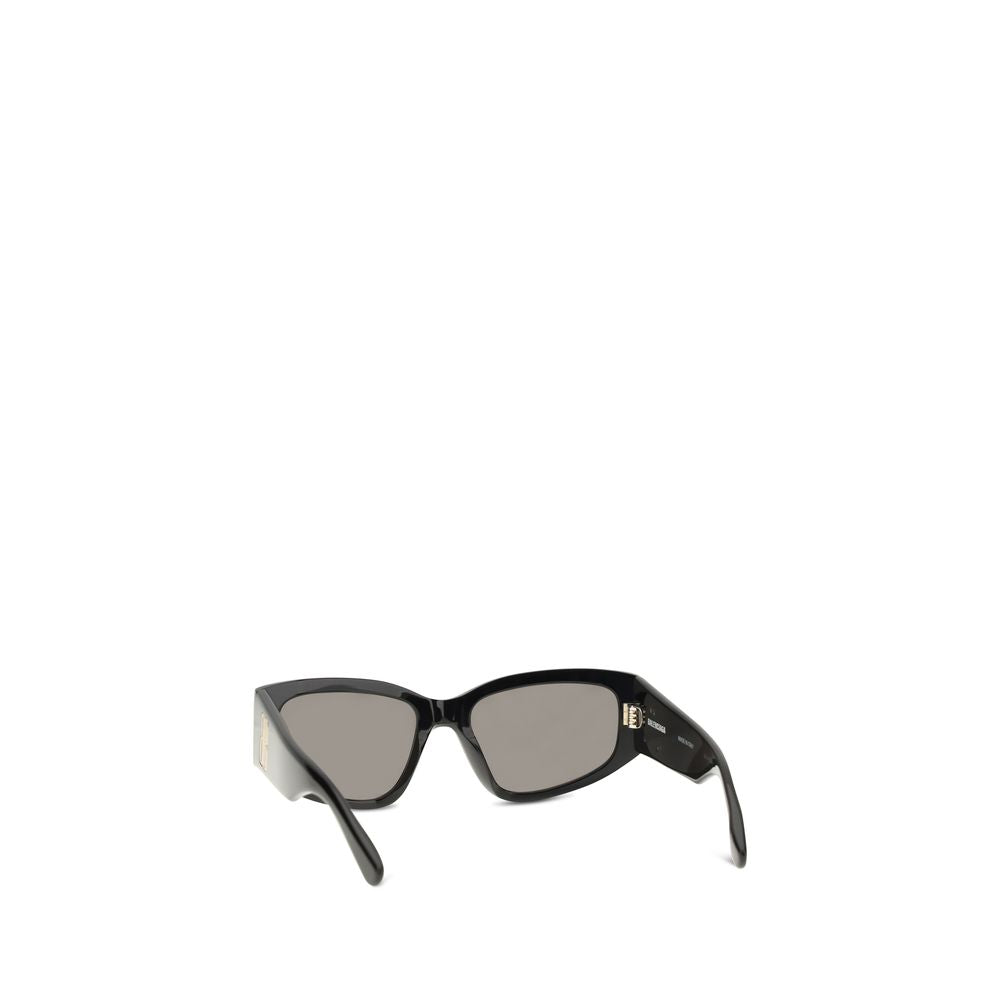 Lunettes de soleil Balenciaga en acétate noir avec monture élégante et design moderne, vues de face.