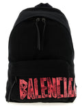 Sac à dos Balenciaga en coton noir avec logo distinctif et design moderne, visible sur l'image.