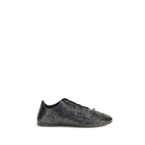 Chaussures Balenciaga Bos Taurus en cuir de veau noir, baskets athlétiques élégantes avec design moderne et détail en cuir.