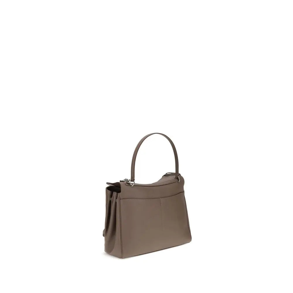 Un sac à bandoulière balenciaga bos taurus en cuir de veau taupe avec une forme rectangulaire et une poignée courbée