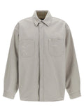 Blouse en coton grise balenciaga avec col et deux poches avant en denim gris délavé effet usé