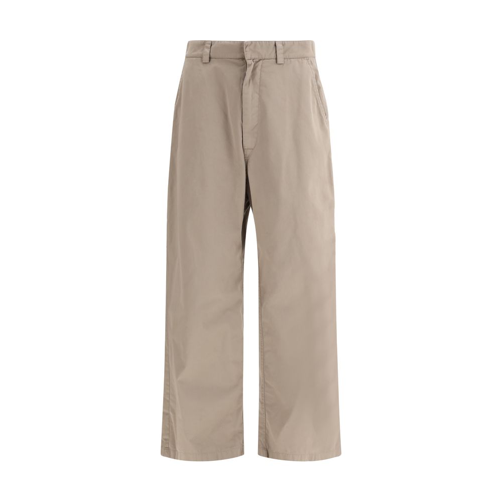 Pantalon décontracté beige en coton de Balenciaga, style casual, avec coupe confortable et détails modernes.