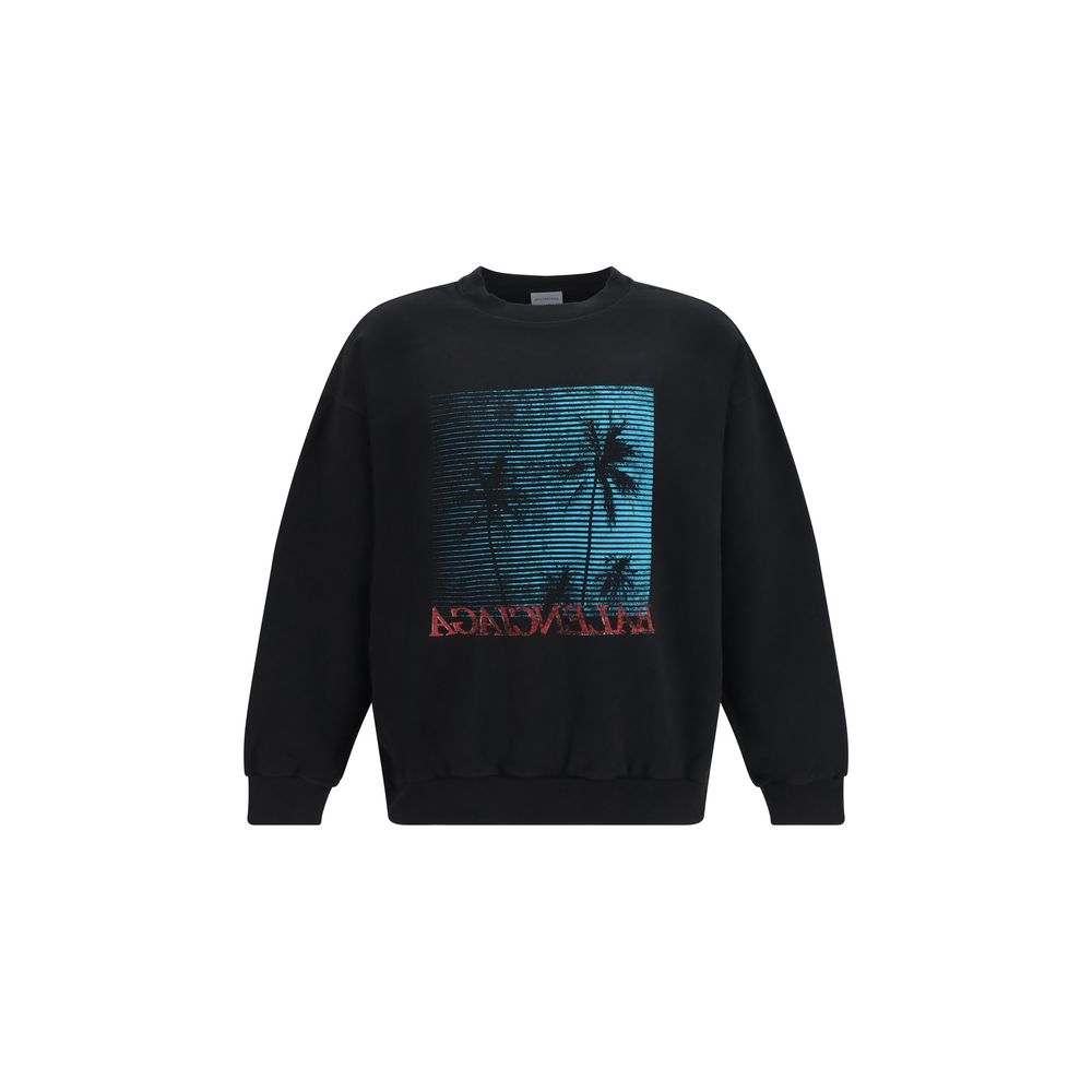 Sweatshirt en coton noir de Balenciaga, coupe décontractée, logo discret sur la poitrine, vue frontale.