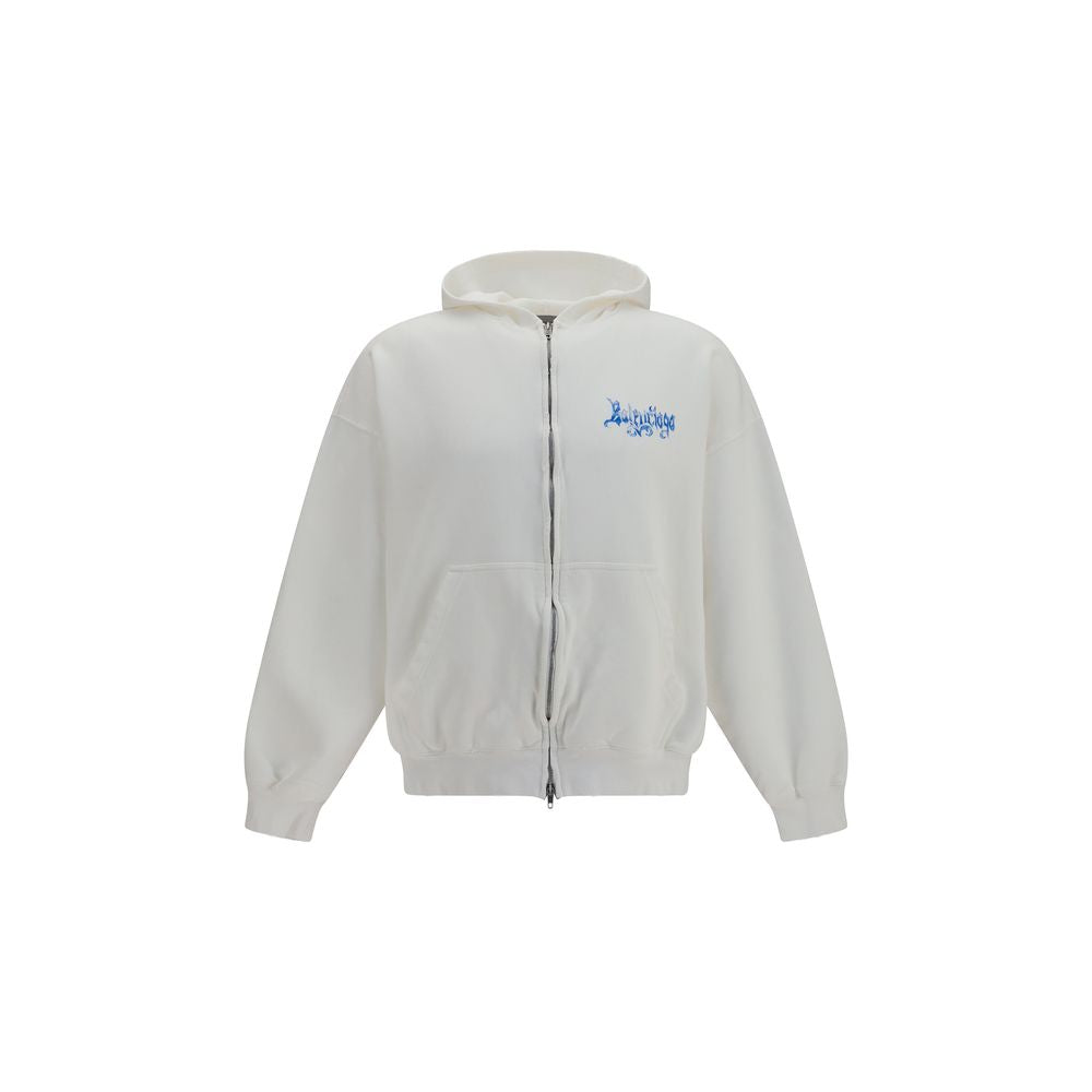 Sweatshirt blanc en coton de Balenciaga, coupe décontractée avec logo discret, porté sur un mannequin.