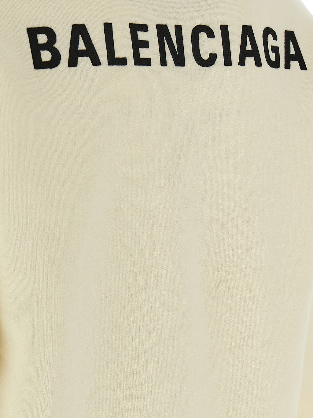 Sweat-shirt beige en coton de Balenciaga, vue de face, avec logo discret et coupe décontractée.