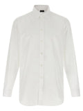 Blouse balenciaga blanche en coton avec col classique manches longues boutonnées et poignets soignés