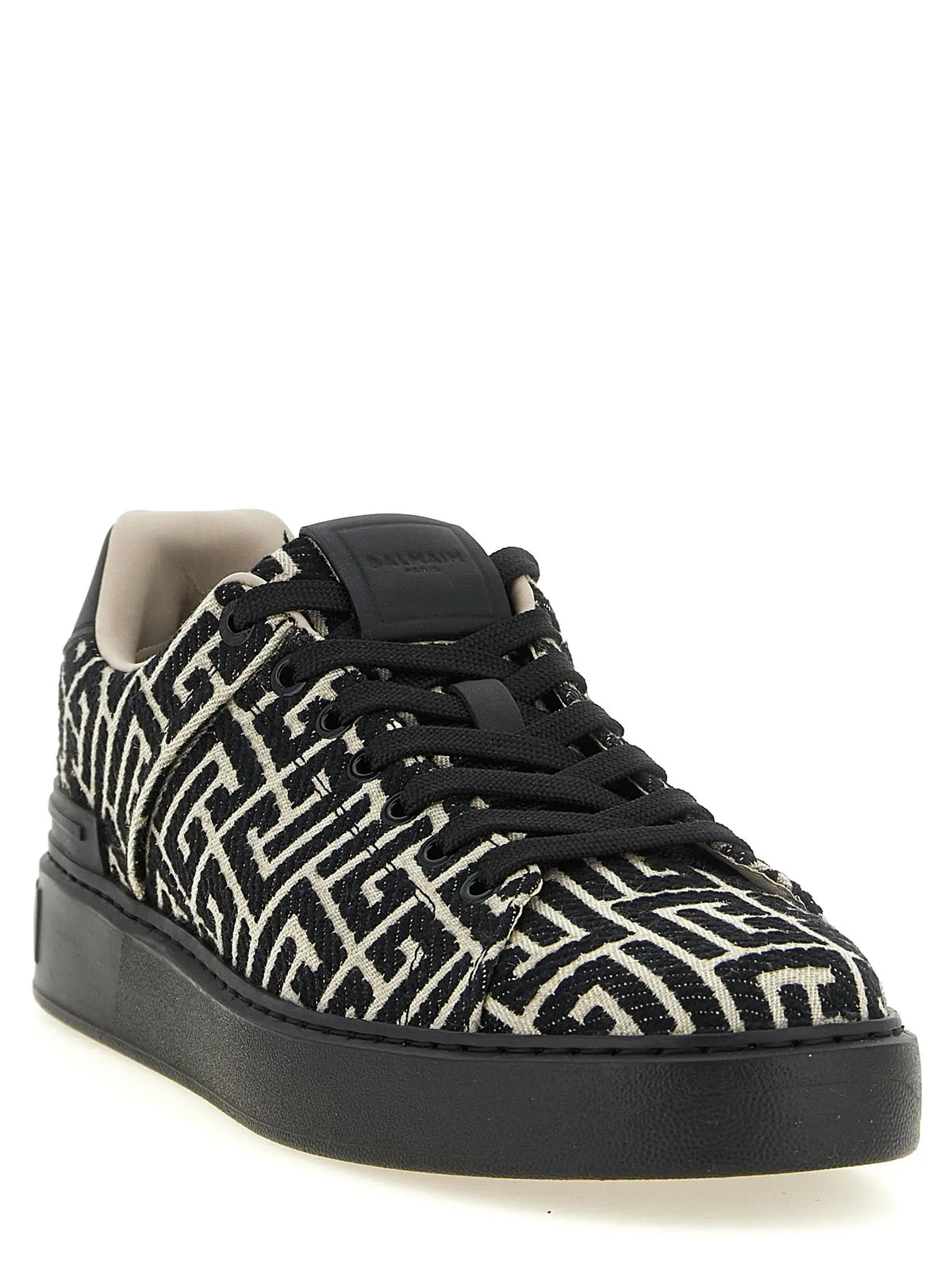 Baskets basses balmain bicolor en coton noir et blanc avec motif géométrique et semelle en caoutchouc épaisse