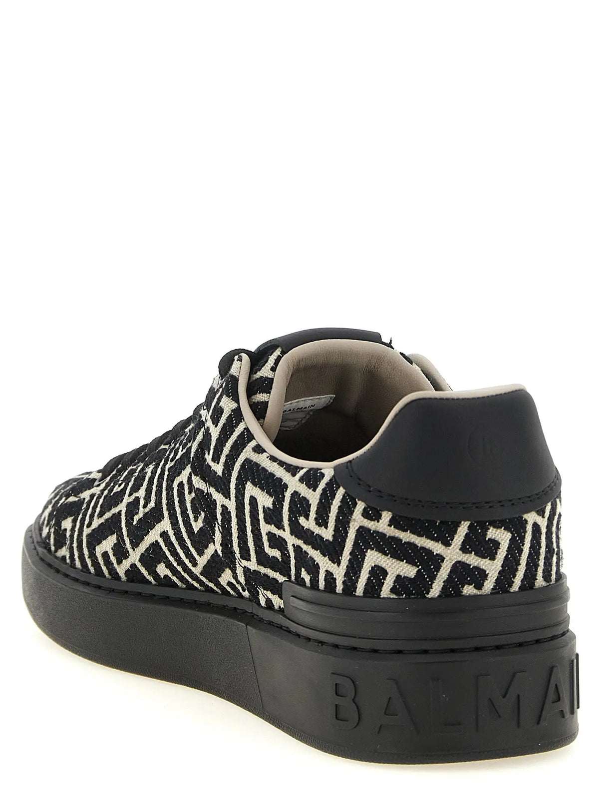 Baskets basses balmain bicolor en coton noir et blanc avec motif géométrique et semelle en caoutchouc embossée