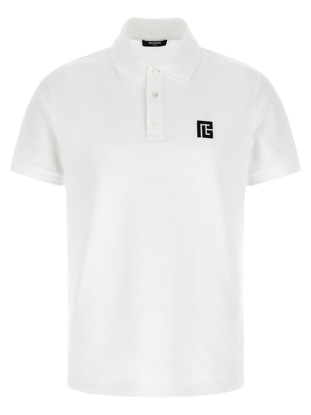 Polo shirt balmain bicolor en coton blanc avec logo noir sur la poitrine et boutons argentés