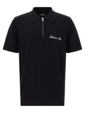 Polo balmain paris en coton bicolore noir avec demi-fermeture éclair et logo blanc brodé sur la poitrine