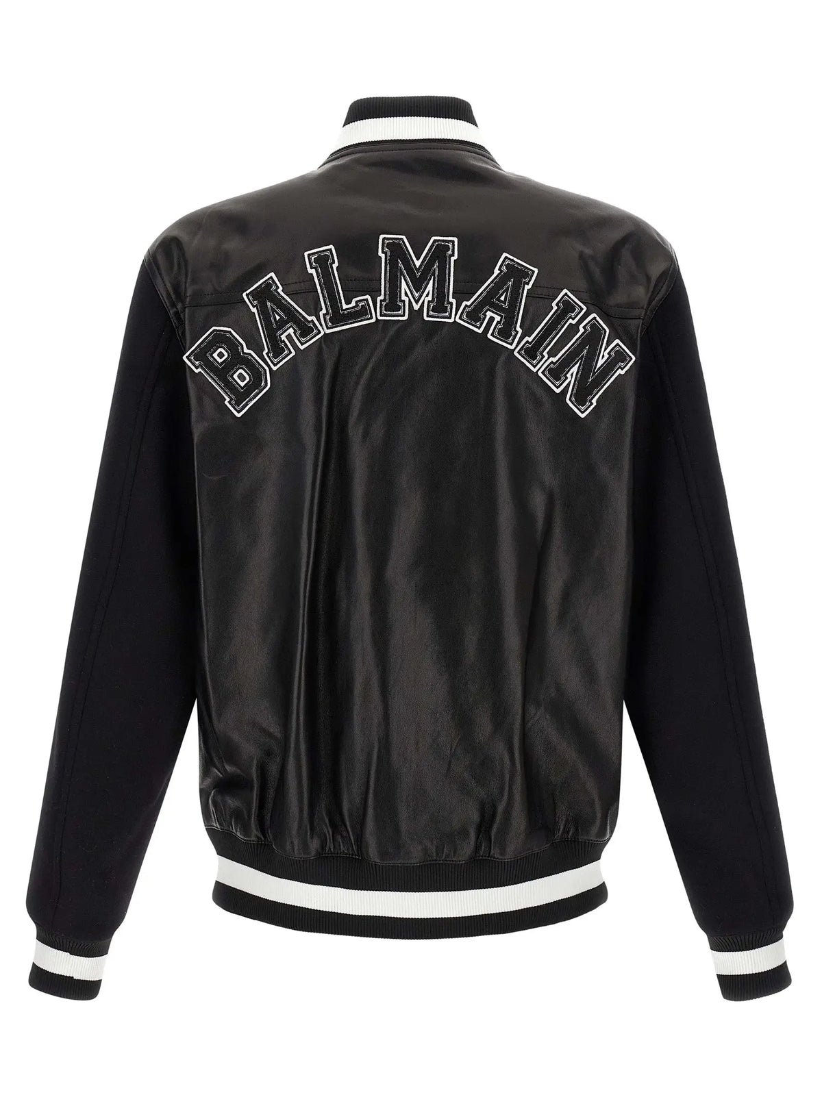 Veste varsity balmain bicolor en cuir dagneau noir avec dos satin brillant et lettrage blanc brodé vue arrière