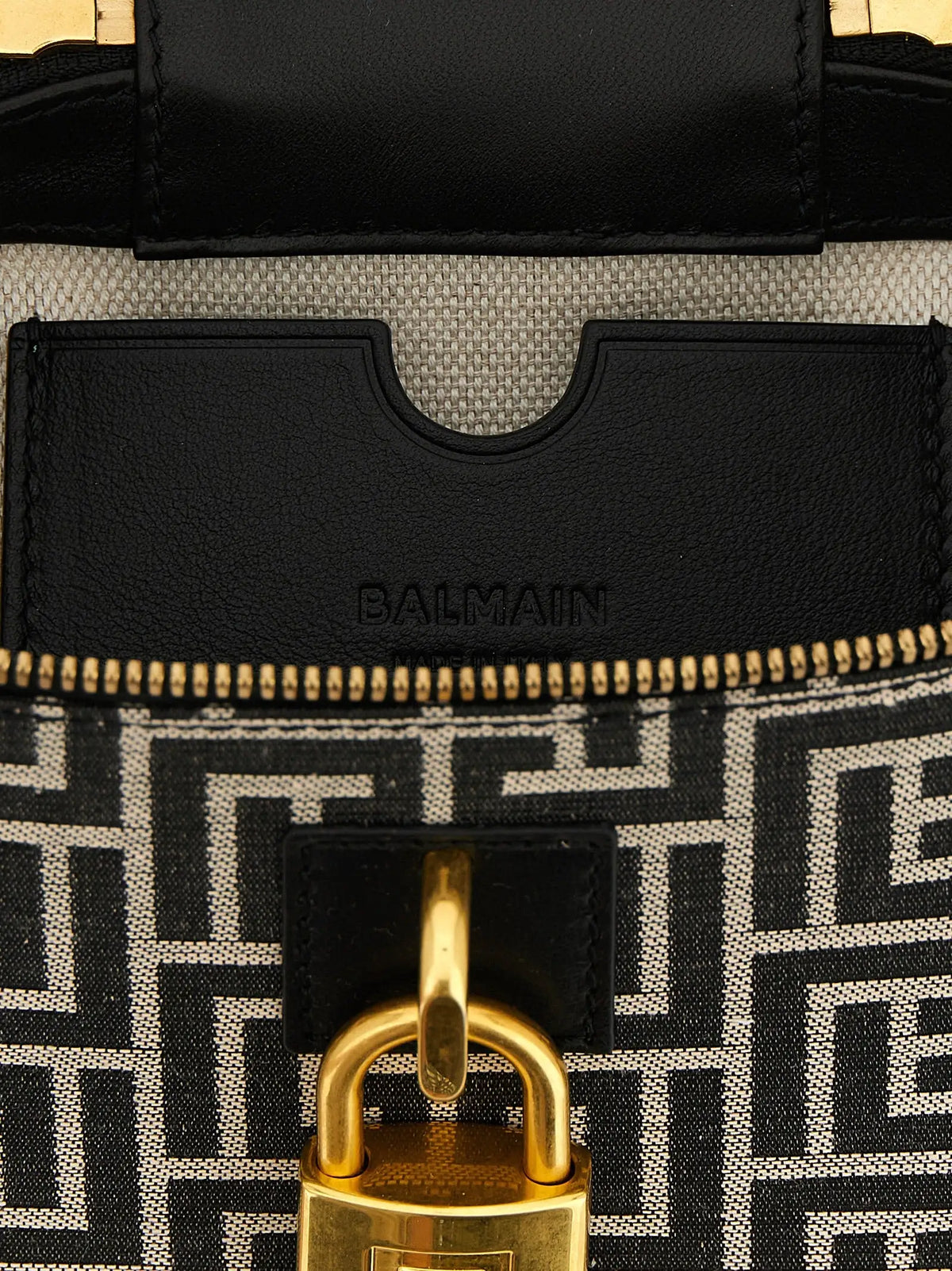 Sac à main balmain bicolor en polyester avec corps en tissu géométrique noir et blanc et finitions en cuir noir